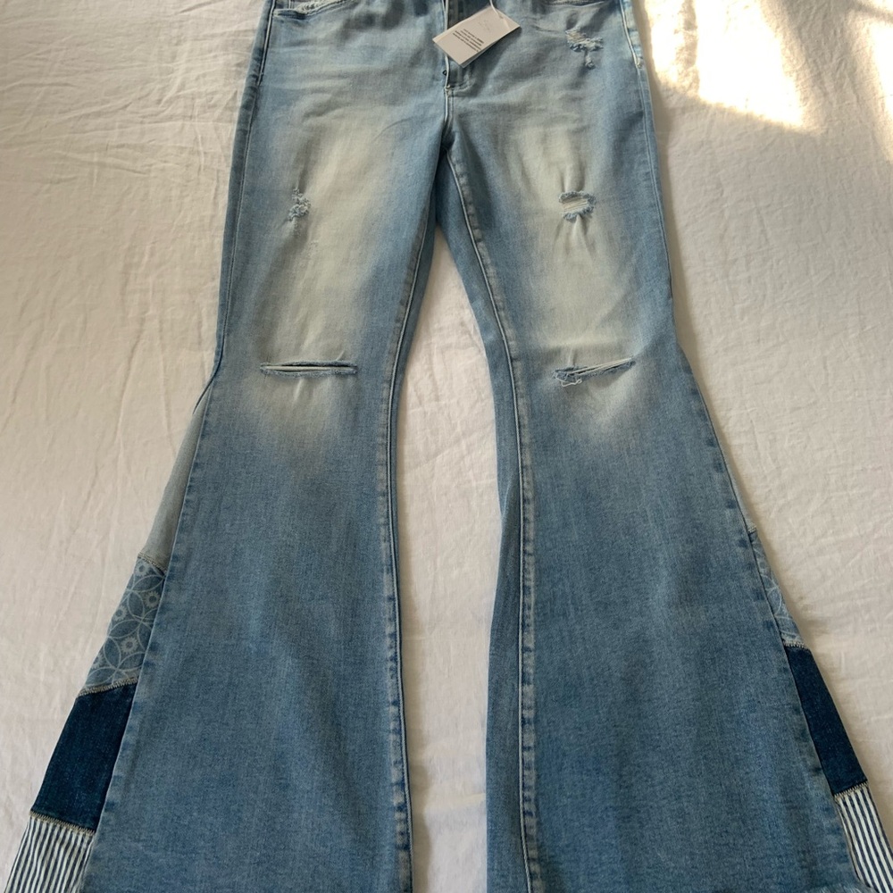 Ceros high rise flare jeans, size 31. New with tags.